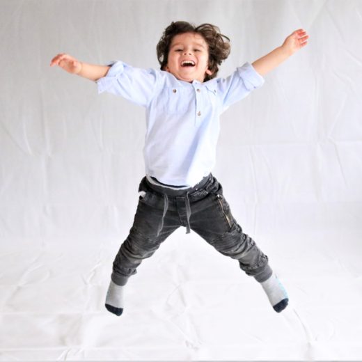 Boy jumping in the air