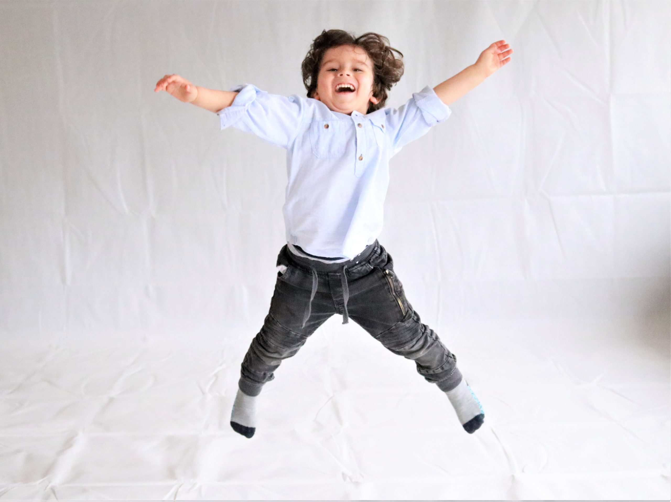 Boy jumping in the air